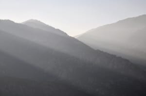 Mountain peaks lit by the setting sun in Corsica.