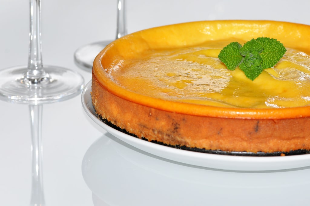 Fiadone, a delicious freshly baked Corsican cheesecake served on a plate, ready to enjoy.