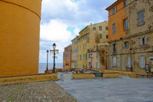Colorful buildings surrounding the Palais des Gouverneurs at the Citadel in Bastia.