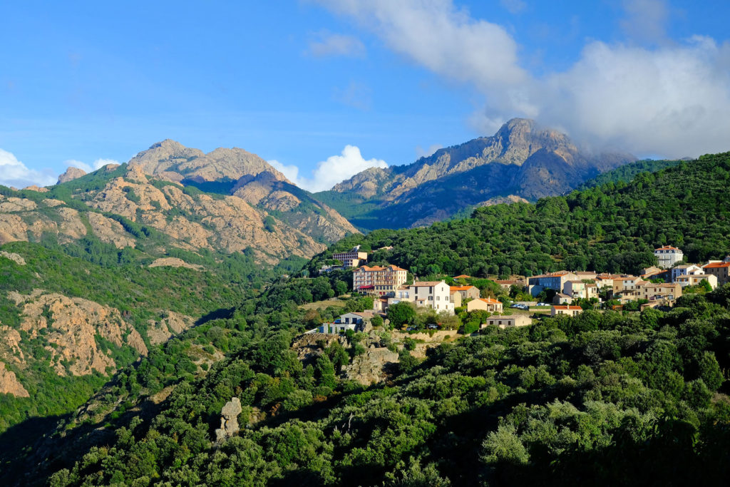 Beautiful village of Piana perched 438 m above the sea level with a backdrop of mountain peaks.