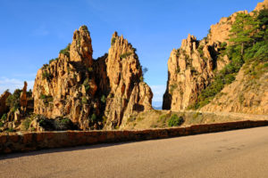 Calanches de Piana, a mesmerizing universe of red porphyry illuminated by the setting sun.