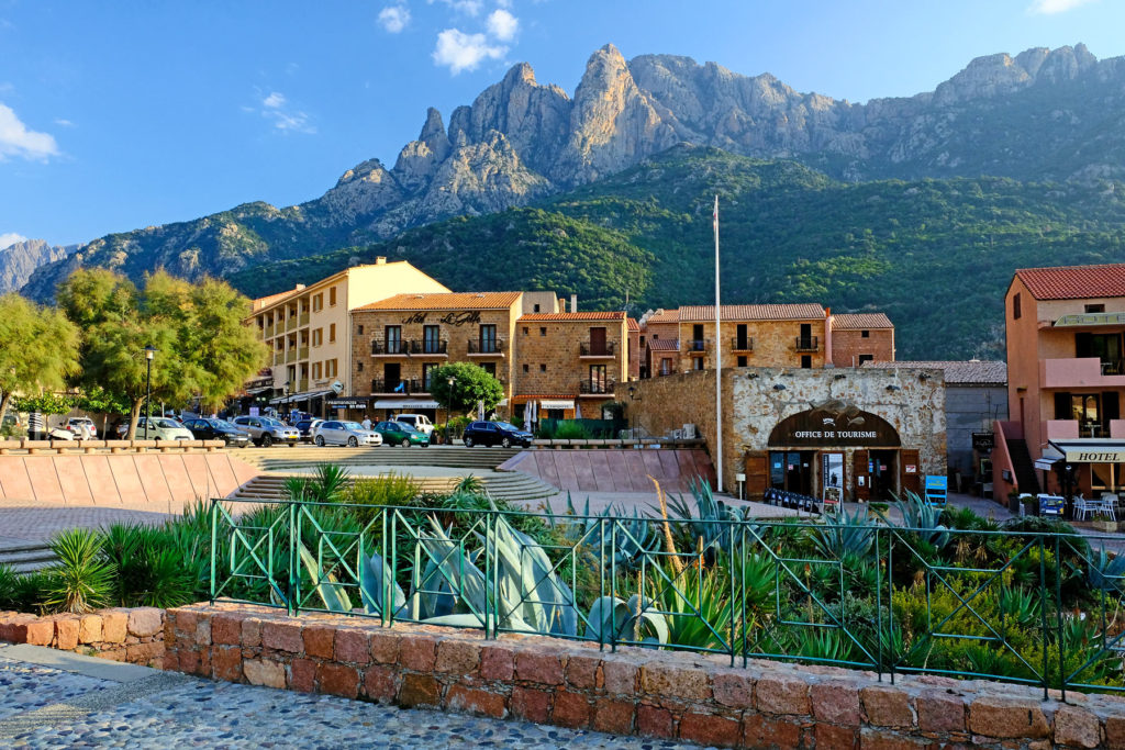 The imposing peak of Capo d'Orto towering 1294 m above the popular town of Porto.