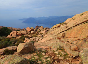 Red granite rocks along the trail to the Capo d'Orto summit.