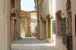 Narrow cobbled streets of the historic Old Town in Bonifacio.