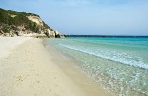Turquoise water and powder white sand of Plage du Grand Sperone.