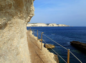Famous Escalier du Roi d'Aragon, a stony staircase carved into the face of the cliff.