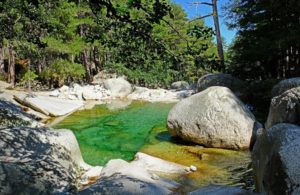 Lined with scented pine trees the river is dotted with a multitude of natural pools of cool transparent water perfect for bathing.