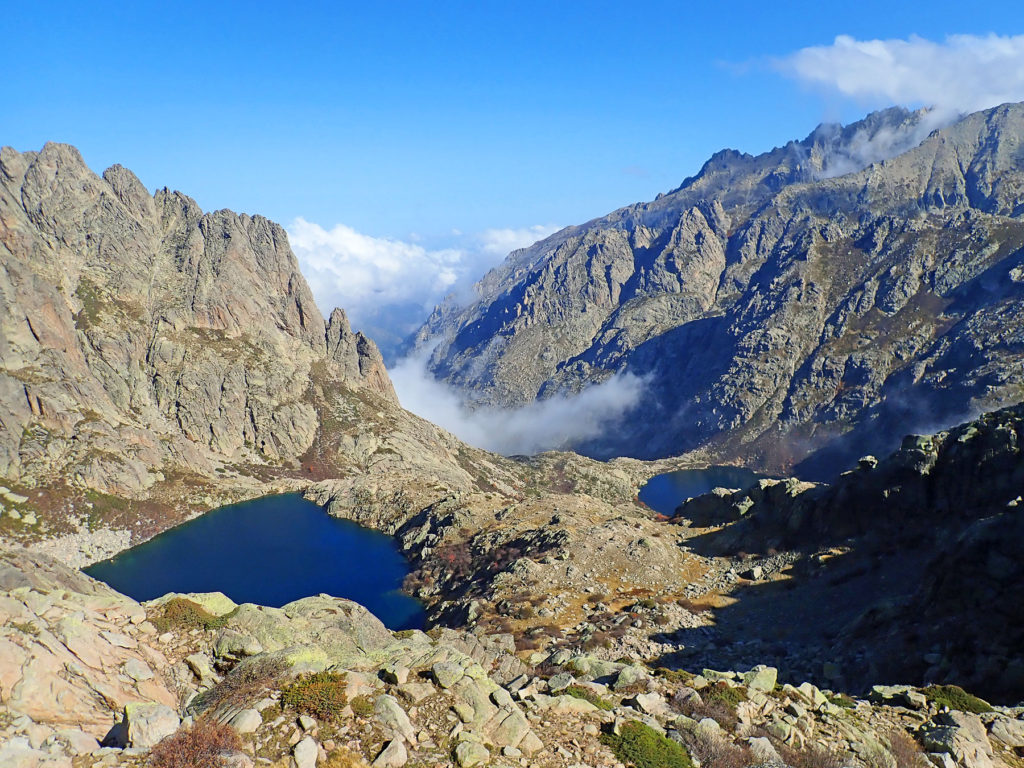 Rugged peaks of the Monte Rotondo massif provide a beautiful backdrop to the pair of glacial lakes.