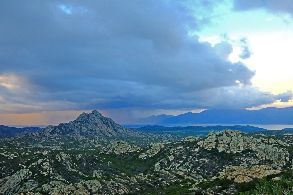 Monte Ghjenuva dominates the rocky terrain of Desert des Agriates.