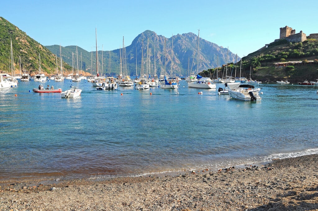A delightful harbour of the Girolata village welcomes day-trip cruise visitors.