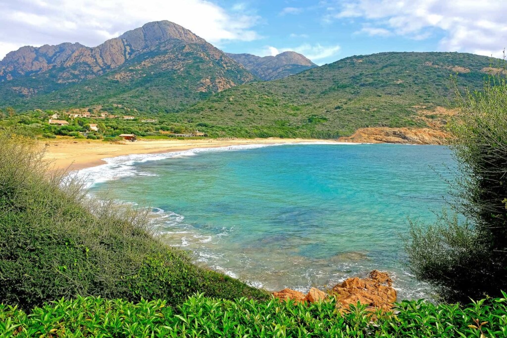 Plage de Arone is dramatically set in Corsica's classic landscapes of rugged northwestern shores.