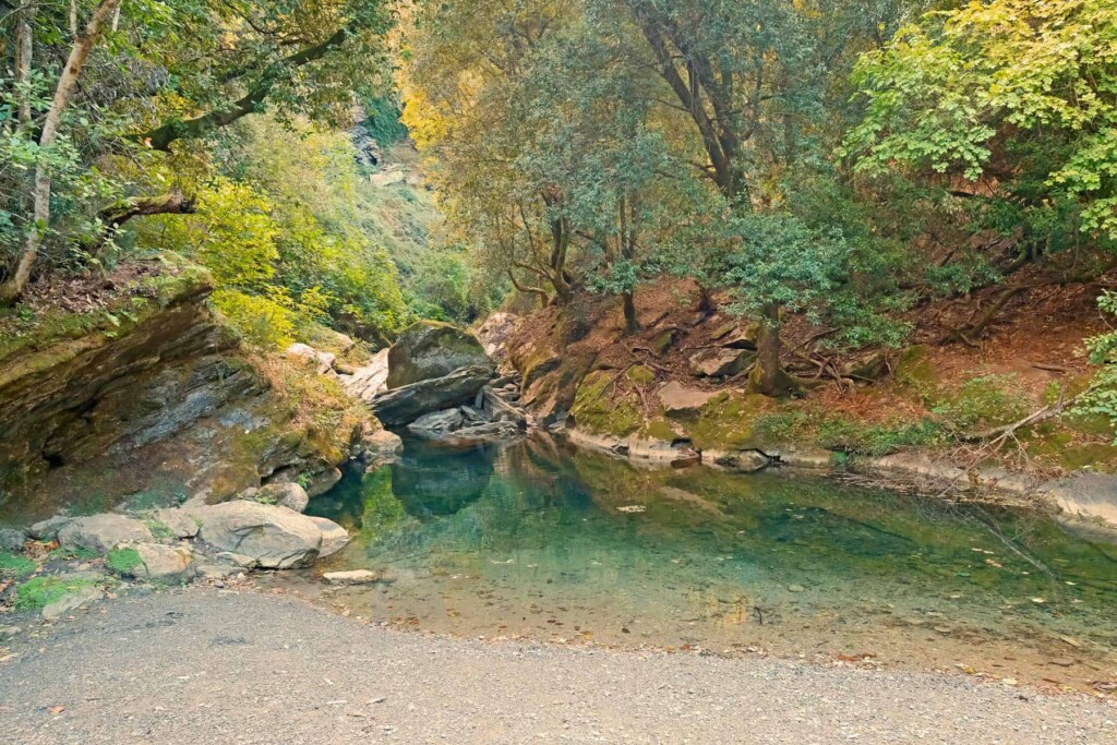 River Petrignani is dotted with emerald water natural pools perfect for a cooling dip.