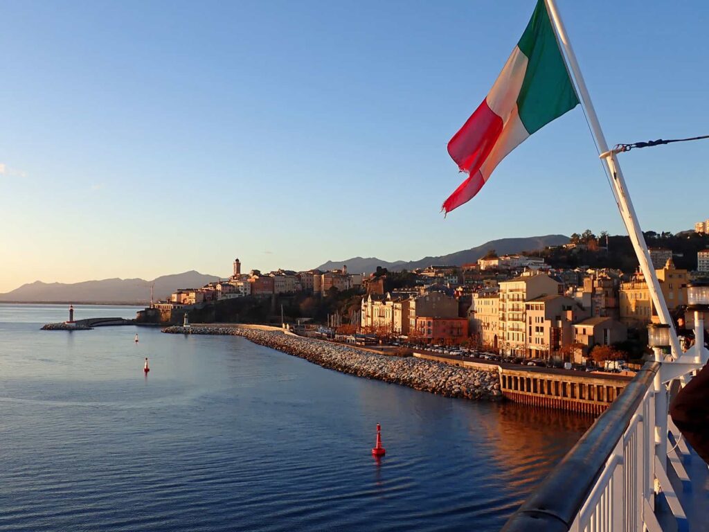 From the ferry's sunny decks, you may admire Bastia's captivating old town.
