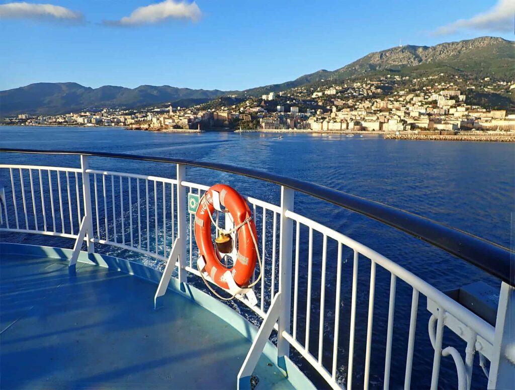 Ferry travel grants an opportunity to view Corsic's scenic coastline from the sea.