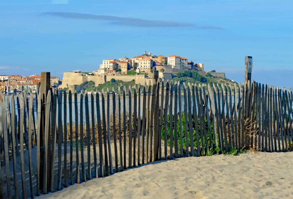 The soft sands of Calvi's beach are home to one of the island's most famous music festivals.