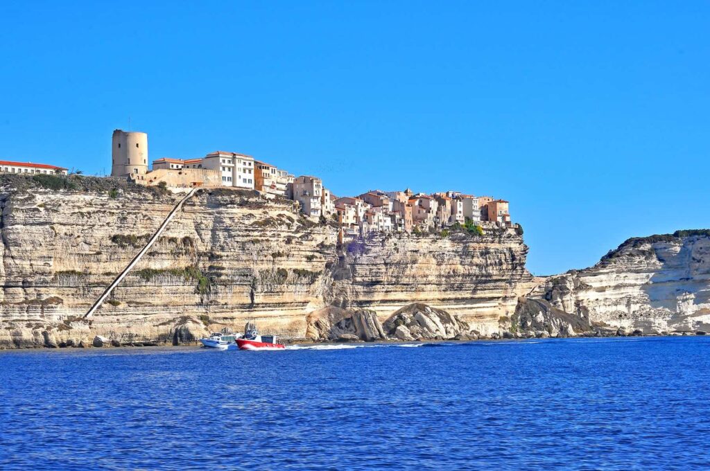 Bonifacio and its tall limestone cliffs are best viewed from the sea on one of the popular sea excursions.