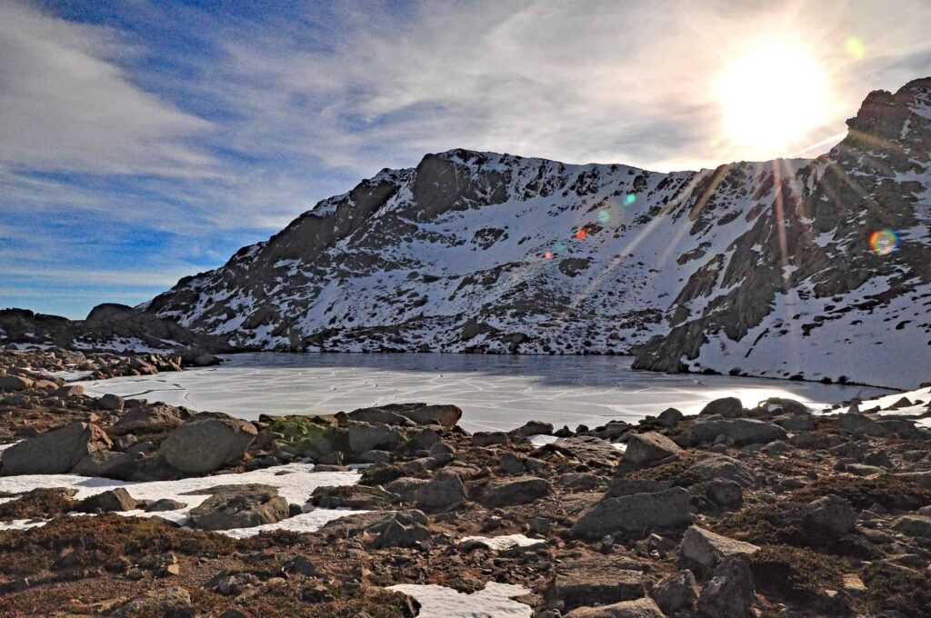 Mineral landscapes of Lac de Bastani may be reached via a scenic hiking trail from the Capanelle resort.