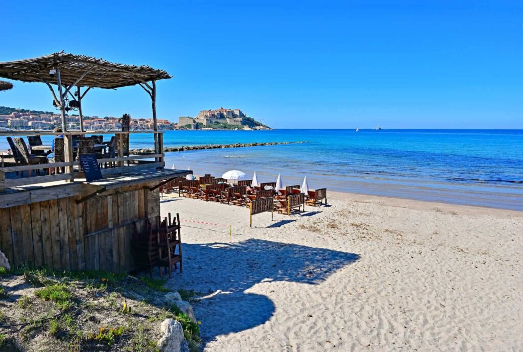 Calvi's six-kilometre stretch of immaculate white sand curves gently along turquoise shores.