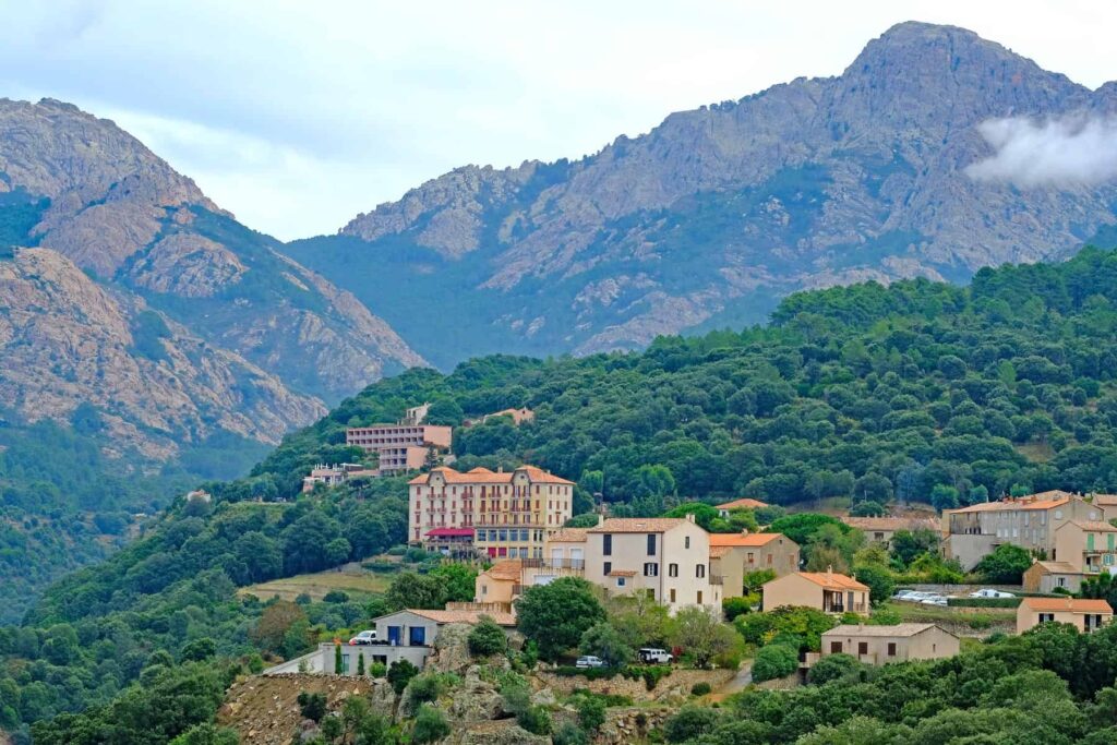 Piana, known as one of France's most beautiful villages,  boasts dramatic red granite calanques and breathtaking views over the Gulf of Porto.
