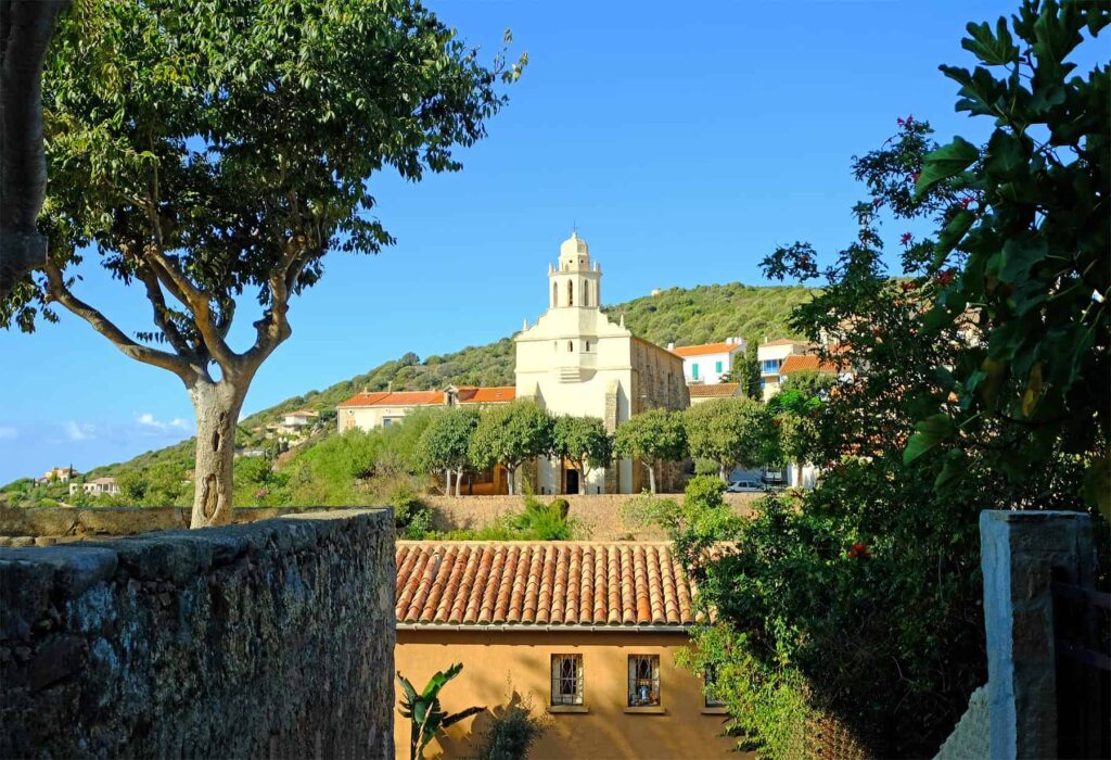 The Greek Orthodox church of Cargese faces its Catholic counterpart on a hill above the marina.