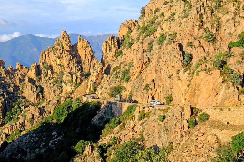 Drive your rental car along Calanques de Piana- one of Corsica’s most breathtaking coastal routes.