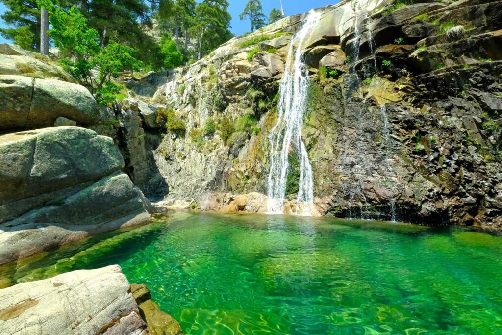 Radule waterfalls impress with their 25-meter drop and cool, inviting pools nestled among Corsica’s rugged peaks.