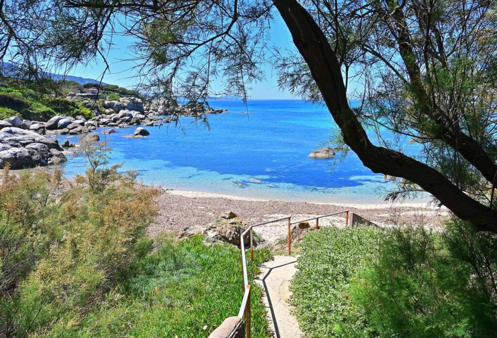 Plage de Manghja Saccu hides a turquoise cove with white sand, west of Marine de Davia.