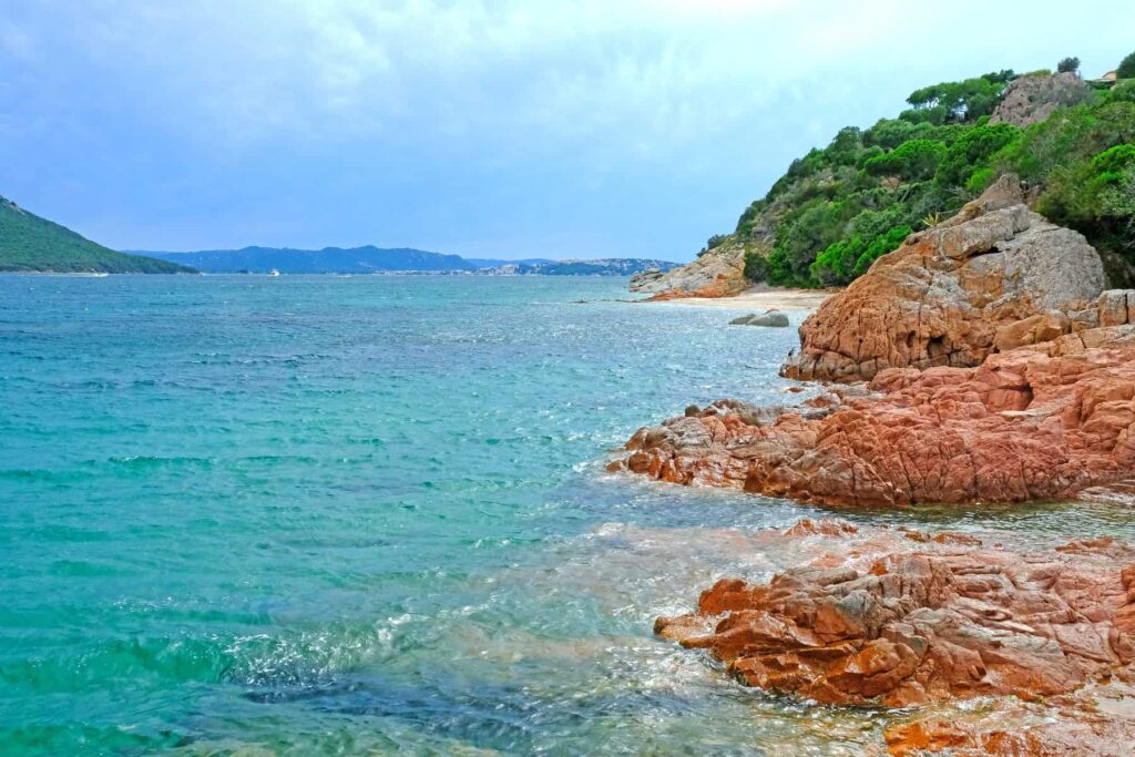 Cala Rossa's coastline extends in a succession of rocky coves perfect for exploring the underwater world.