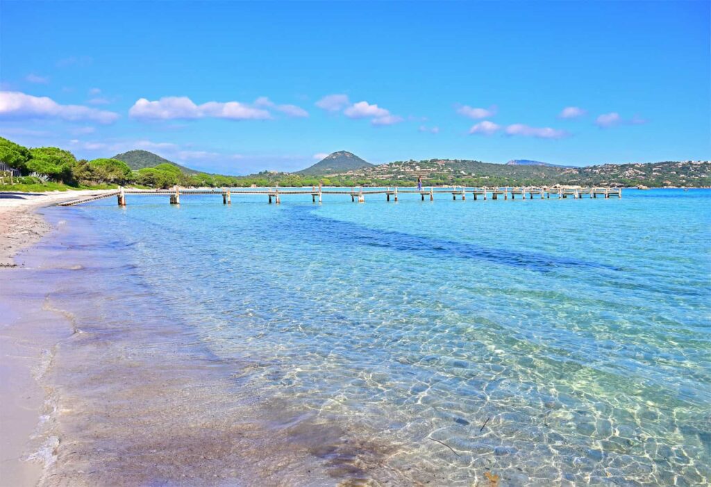 At Santa Giulia, hotels are set among the verdant slopes, surrounded by lush Mediterranean flora.