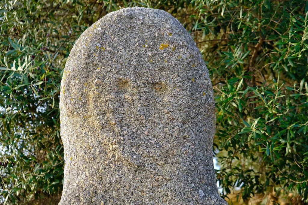 Centuries of erosion have smoothed the granite surfaces, yet the carvings remain visible.