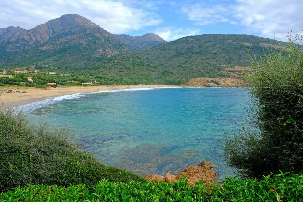 The wild Arone Beach is one of the Gulf's finest places to swim, snorkel, and unwind.