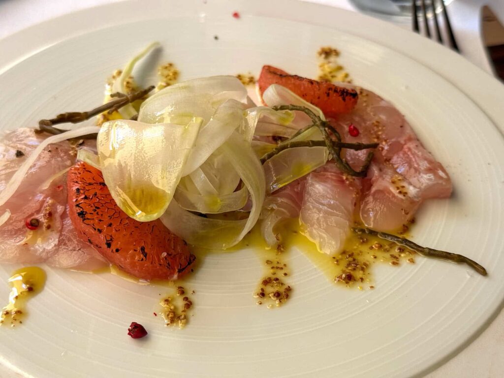 Local seafood, Corsican wine, and waterfront views make for an unforgettable evening.